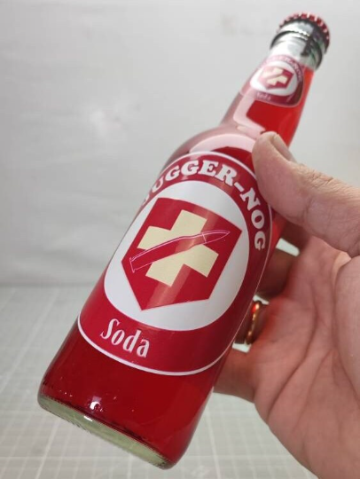Jugger-nog soda, botella -no bebible- 33cl